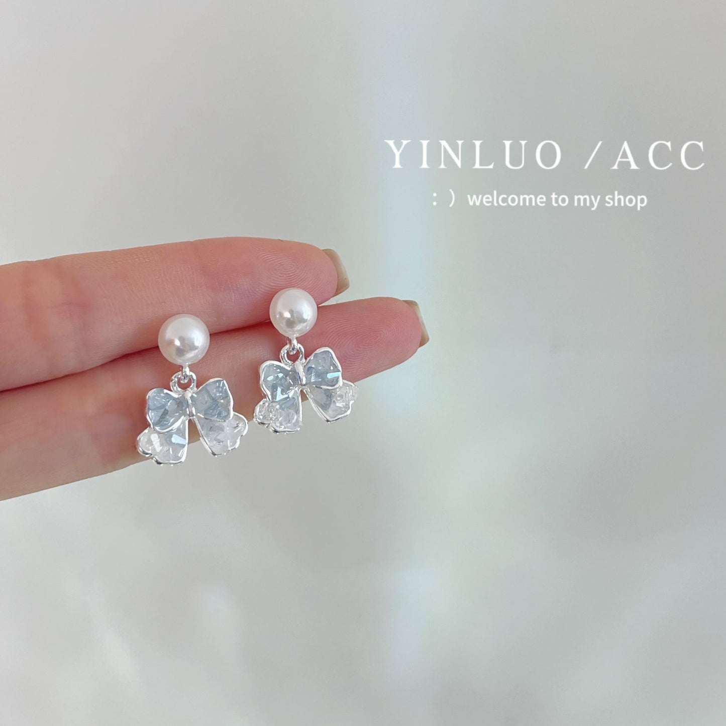 BT1238溫柔氣質冰藍水晶蝴蝶結耳環2024.05.14