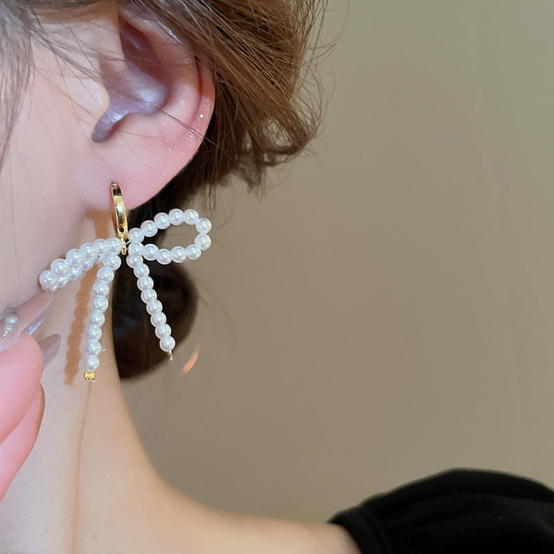 EA9529優雅百搭法式甜美珍珠蝴蝶結耳環2024.04.09