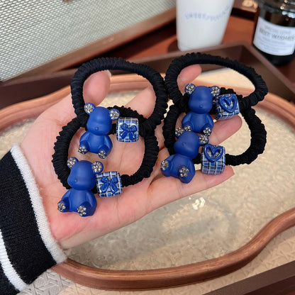 AD6593克萊因藍色小熊愛心領結方塊髮圈2024.12.13