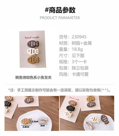 CO0945可愛搞怪卡通秋冬米咖色鯛魚燒小魚髮夾3個2023.10.10