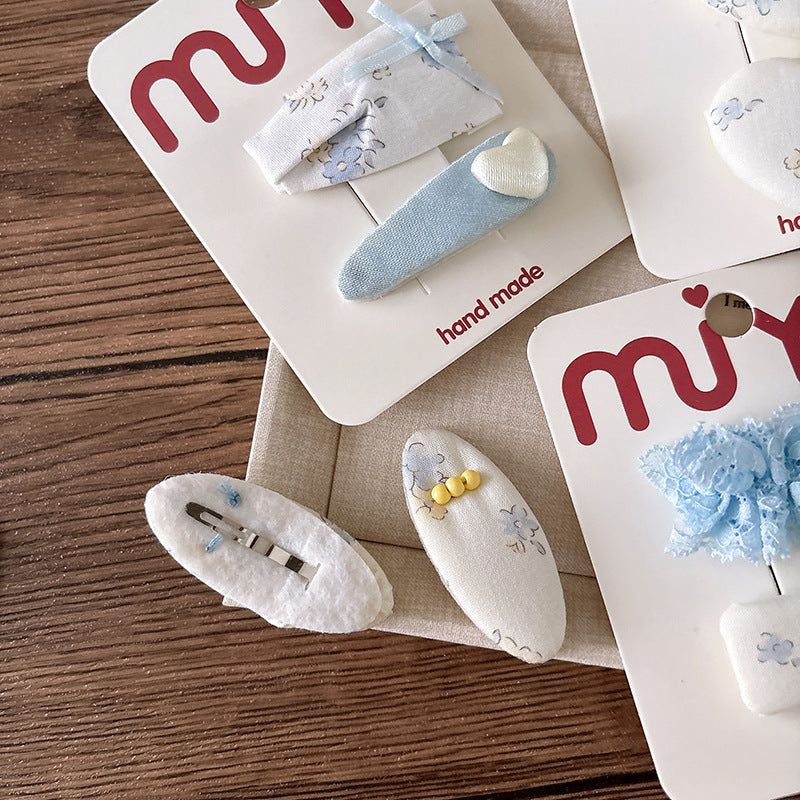 CJ0622韓版甜美海鹽藍碎花布藝蝴蝶結少女心髮夾2025.07.18