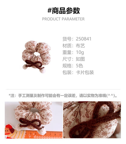 CA0841早秋甜美奶咖色格紋女孩花苞腸圈2025.08.26