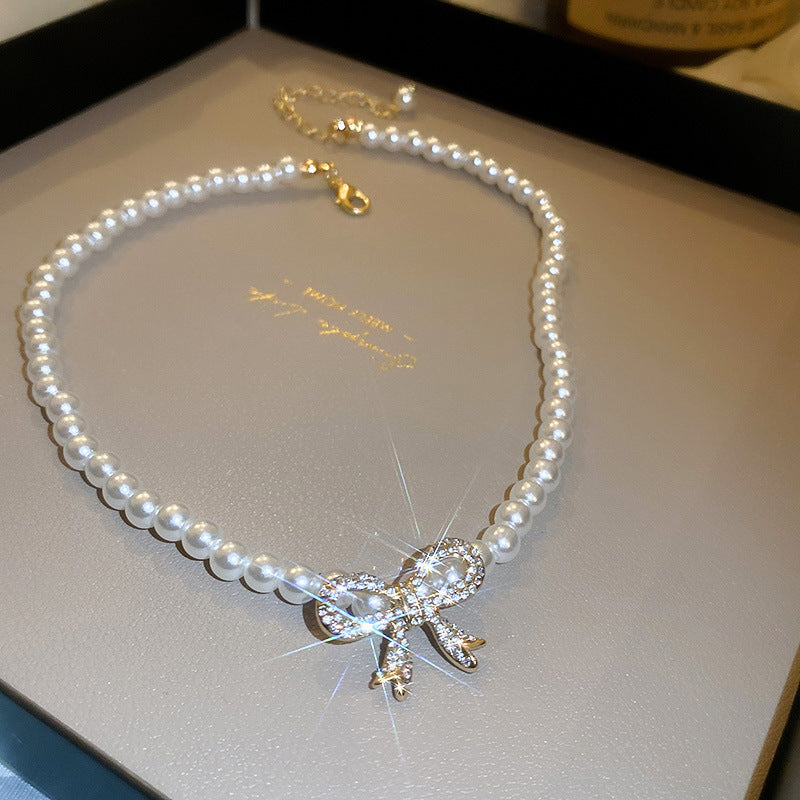 EN2080法式復古珍珠鑲鑽蝴蝶結項鍊2024.05.21